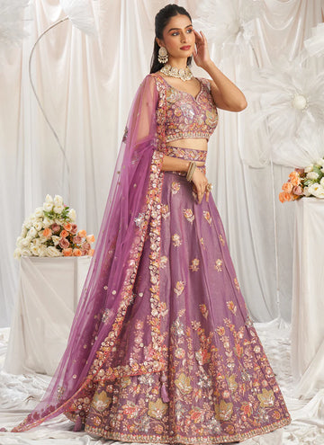 Captivating Onion pink colored silk fully embroidered lehenga choli with sequin zari work.